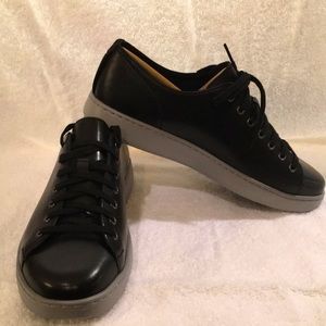 UGG Black Pismo Sneaker with grey sole. NIB never worn. Size 8.5 USA.